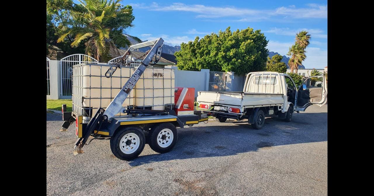 A Man With A Van truck and trailer loaded for a Helderberg job